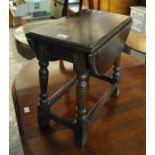 Small oak drop leaf table. (B.P. 21% + VAT)