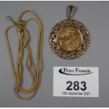 Gold full sovereign dated 1911 with 9ct gold mount and 9ct gold chain. Chain weighs 3.7g approx. (