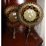 Two brass pierced trivets in the form of tripod pedestal tables. (2) (B.P. 21% + VAT)