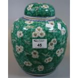 Chinese porcelain baluster-shaped ginger jar and cover, 'Cracked Ice' pattern over a green enamelled