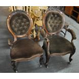Pair of Victorian walnut ladies and gentleman's button-back upholstered fireside chairs. (2) (B.P.
