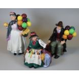 Royal Doulton 'The Balloon Man' HN1954, 'Biddy Pennyfarthing' HN1843 and 'Silks and Ribbons' HN2017.