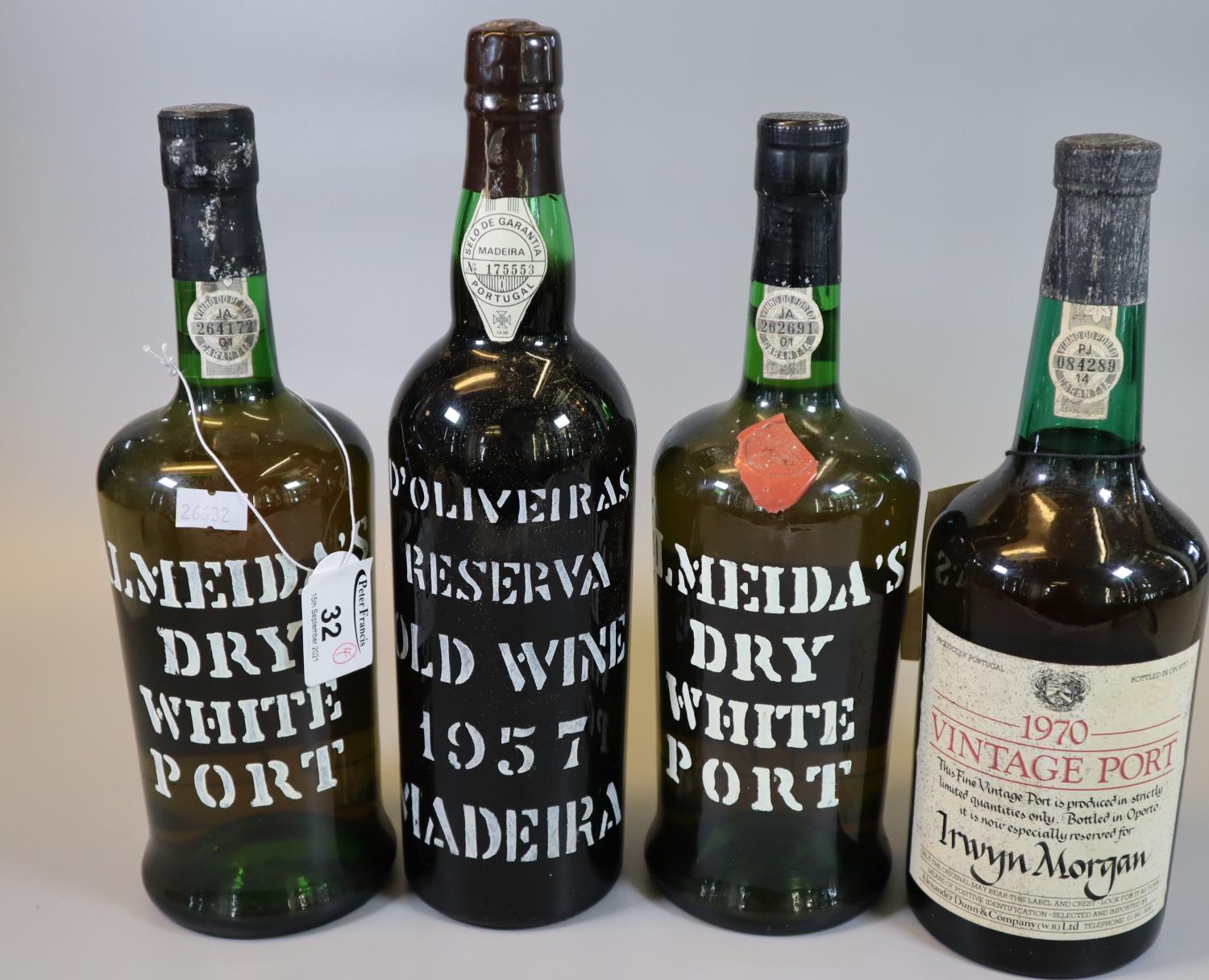 Collection of port to include; two Almeida's dry white port, D'Oliveiras Reserva old wine 1957