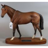 Beswick Connoisseur model of Troy racehorse of the year 1979, on wooden mahogany oval base. (B.P.