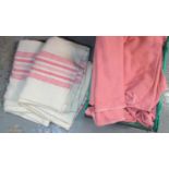 Box containing three plain vintage woollen blankets, and two cream with pink stripes with 'Popular