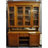 Late Victorian oak two-stage cabinet back dog kennel dresser on bun feet. (B.P. 21% + VAT)