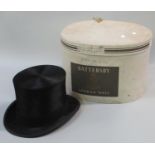 Small size Henry Heath silk top hat labelled 6 1/8, in cardboard hat box. (B.P. 21 + VAT)