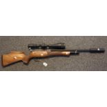 Huntsman Regal Harper patent Daystate air rifle with compression chamber, having Hawke 16 x 50