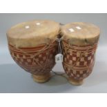 Pair of ceramic velum covered string mounted tom tom drums. (B.P. 21 + VAT)