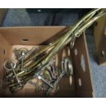 Box of equestrian equipment containing four horses bits, pair of stirrups, four brass haines. (B.
