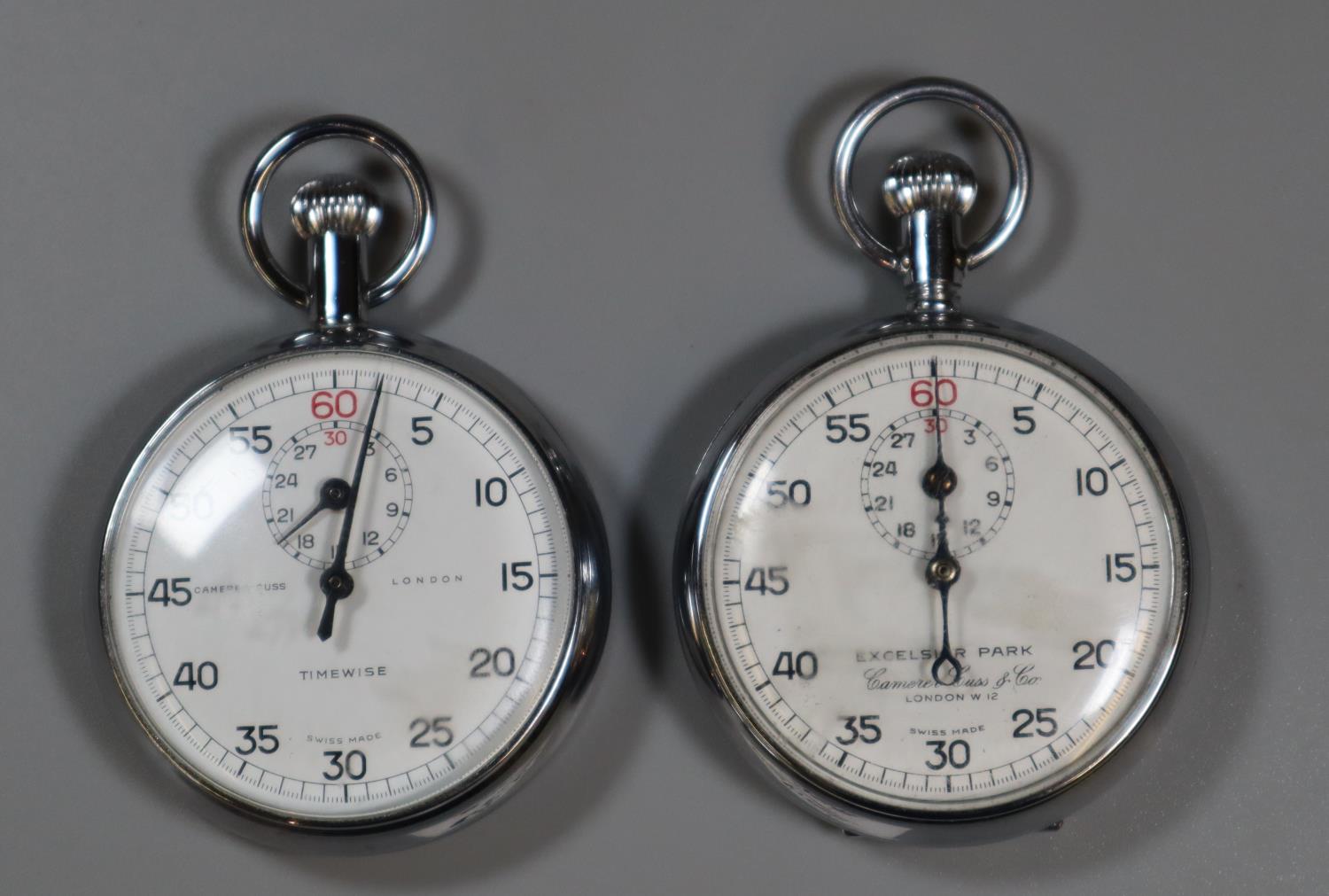 Two chrome plated stop watches marked Camera Cuss Timewise, and Excelsior Park Camera Cuss & co.