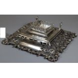 Victorian silver single desk inkwell with pierced foliate boarders, vacant cartouche, and pen