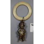 Early 20th century silver plated babies rattle in the form of a young boy with top hate, together