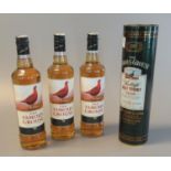 Three bottles of The Famous Grouse blended scotch whisky. 70cl, 40% vol. Together with The Famous
