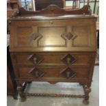 Early 20th century oak fall front bureau in Jacobean style with barley twist supports. (B.P. 21 +