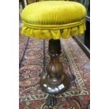 Victorian rosewood piano stool on fluted baluster pedestal and paw feet. (B.P. 21 + VAT)