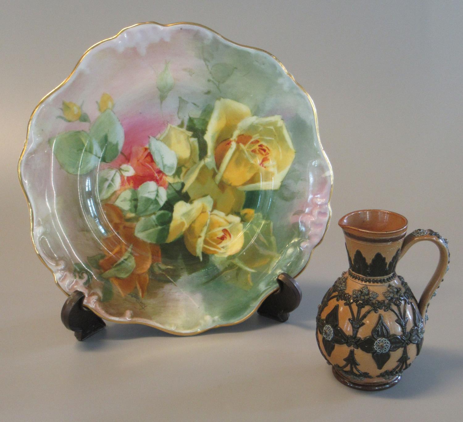 Doulton Lambeth 1884 stoneware baluster single handled jug with relief moulded flowerhead and