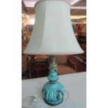 Turquoise ceramic and white metal lamp base with cream shade. (B.P. 21% + VAT)