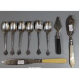 Set of six silver teaspoons, Sheffield hallmarks. Together with a miniature silver plated trowel