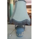 Blue and white Jasperware lamp with a blue tasselled light shade. (B.P. 21% + VAT)