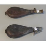 Two leather shot flasks with brass dispenser mounts. (B.P. 21% + VAT)
