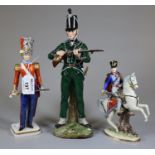 Three Continental porcelain military figures to include '95th Rifleman Private 1815' (lost top of