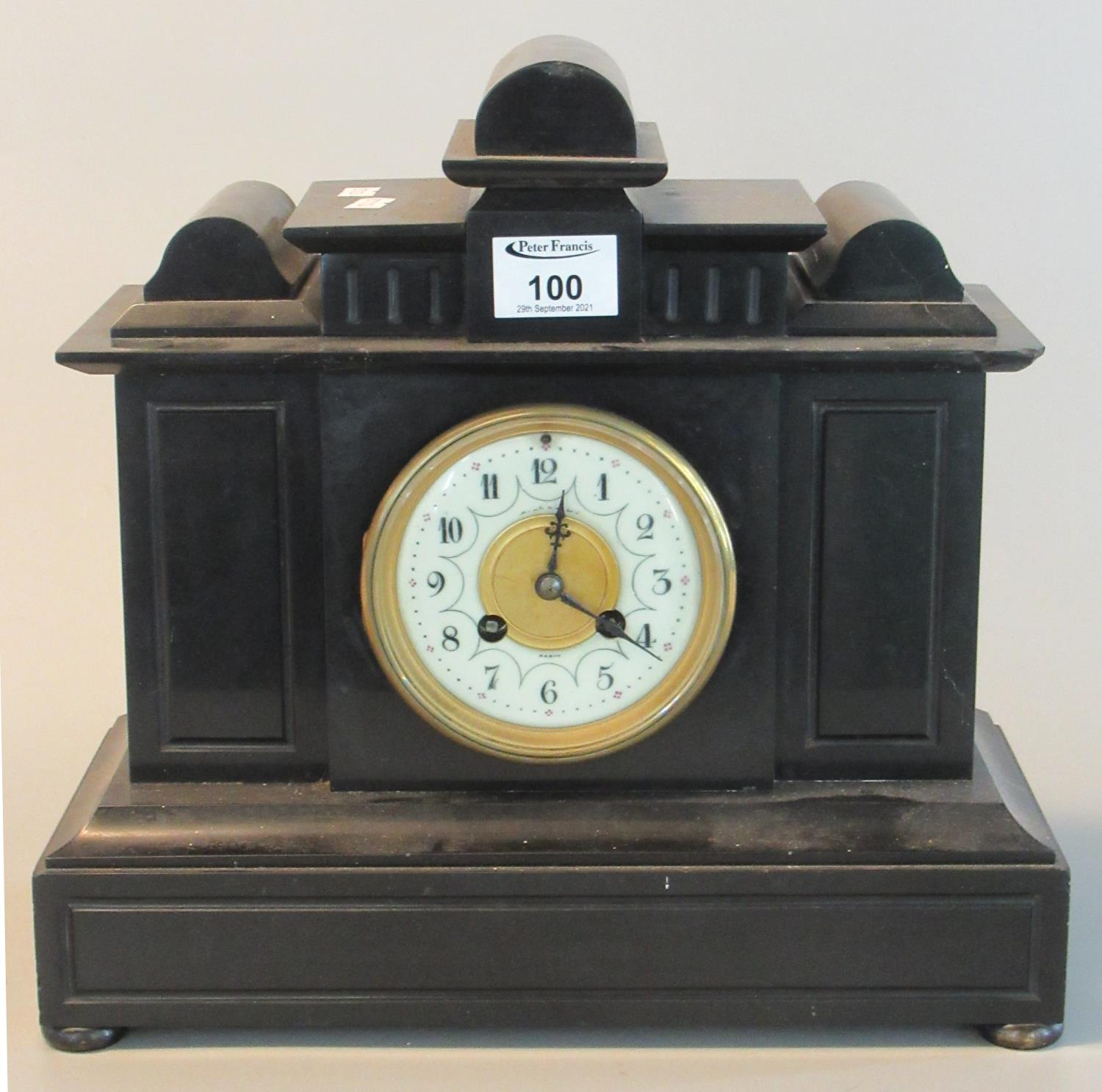 Late 19th century black slate two-train architectural mantel clock with Arabic numerals. 33 cm