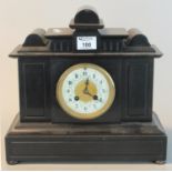 Late 19th century black slate two-train architectural mantel clock with Arabic numerals. 33 cm