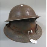 Two probably WWII period or immediate post war military helmets, British and French. (2) (B.P.