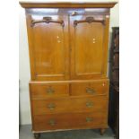 Late Victorian oak two stage blind panel press cupboard with two short and two long drawers on