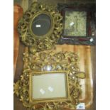 Tray containing five picture frames to include: two oval foliate decorated gilt metal frames, two