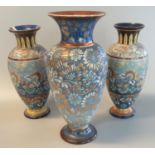 Pair of Doulton Lambeth stoneware baluster vases, hand painted with flowers and foliage together
