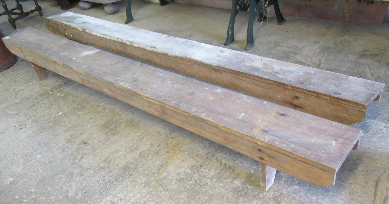 Two similar early 20th century rustic benches of low proportions. 260 x 31 cm approx. (2) (B.P.