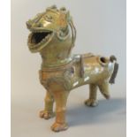 Unusual Oriental style glazed pottery temple lion, possibly designed as a pouring vessel with