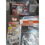 Box containing Beatles jigsaw puzzle, three Beatles double CD anthologies, book entitled: 'I, Me,