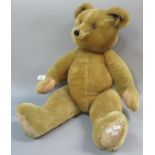 Large size Twyford gold plush teddy bear. (B.P. 21 + VAT)