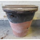 Terracotta two tone two-handled pot with butter pat and associate wooden lid. (B.P. 21% + VAT)