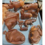 Tray of carved wooden animals to include a pair of elephant book ends, two bison plaques, pair of