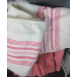 Box containing three plain vintage woollen blankets, and two cream with pink stripes with 'Popular