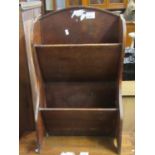 Early 20th century oak book trough/magazine rack, together with a 20th century oak side or lap table