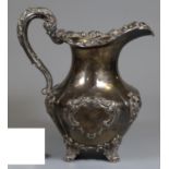 19th century silver rococo style single-handled jug. Dublin hallmarks. 13.3 troy oz approx. (B.P.