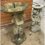 Two similar composition bird baths decorated with cherubs, one with dog. (2) (B.P. 21% + VAT)