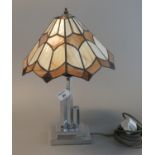 Chrome plated art deco design lamp base with modern Tiffany style leaded shade. 46 cm high