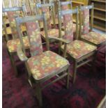 Set of six elm Ercol dining chairs with floral and foliate upholstery, 4 & 2. (6) (B.P. 21 + VAT)