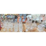 Two trays of glass wear to include: five cut glass and moulded glass decanters, six lead crystal cut