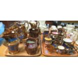 Two trays of copper lustre jugs and other items. Five large jugs, three medium, and seven small with