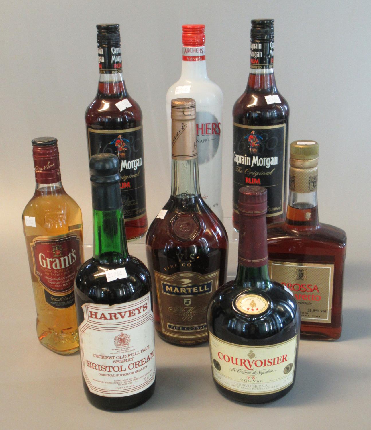 Collection of alcoholic spirits to include two bottles Captain Morgan the original rum, V.S. Fine