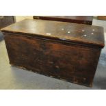Victorian stained pine trunk of rectangular form with metal loop carrying handles. (B.P. 21 + VAT)
