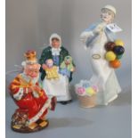 Royal Doulton bone china figurine 'The Ragdoll Seller' HN2944, together with 'Old King Cole', DNR5