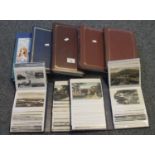 Postcard selection in seven albums with good range of various topographical cards with some welsh